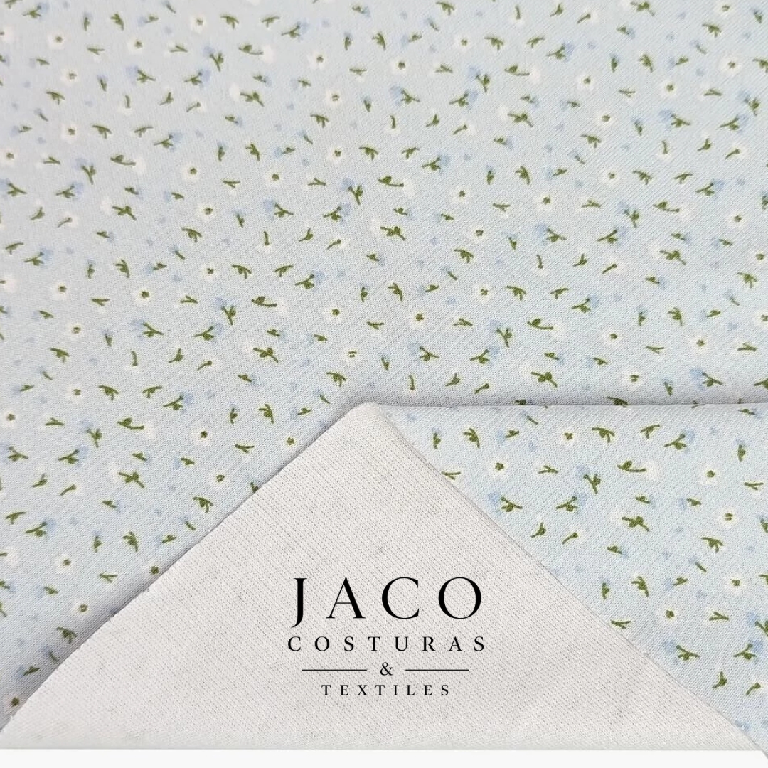 Interlock Estampado Celeste Florecitas Blancas - Imagen 3