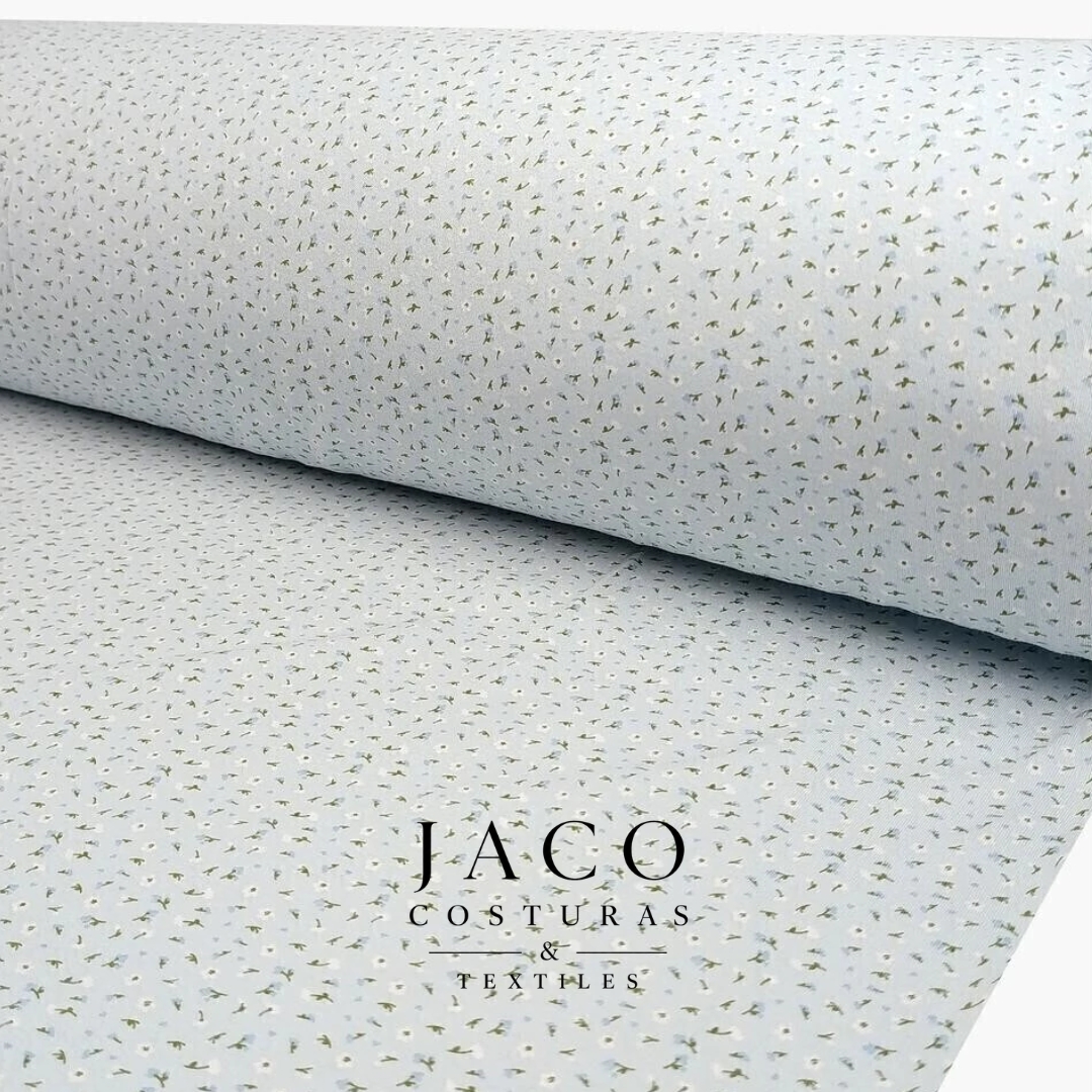 Interlock Estampado Celeste Florecitas Blancas - Imagen 2